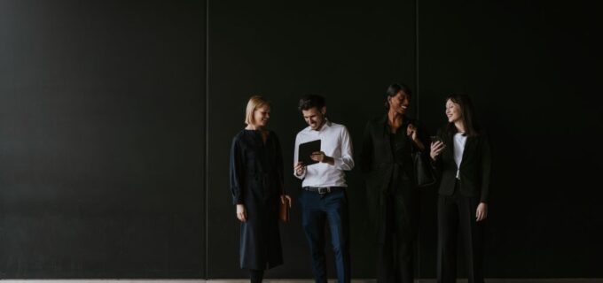 business-professionals-collaborating-in-front-of-a-2026-06-25-20-04-23-utc (1)