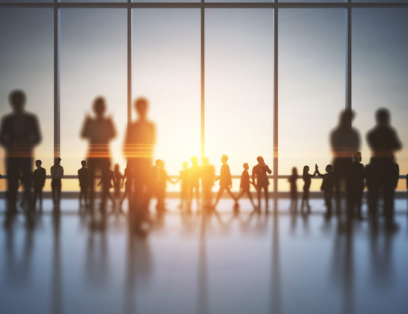 backlit-crowd-of-business-people-working-together-2026-03-26-05-31-36-utc